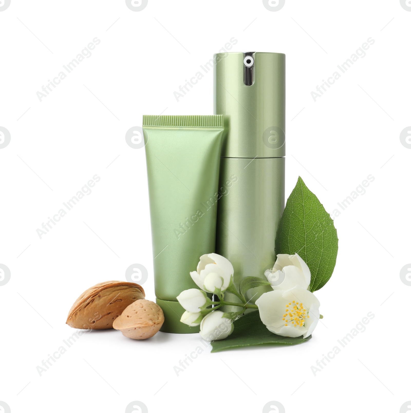 Photo of Cosmetic products, almond nuts and flowers on white background