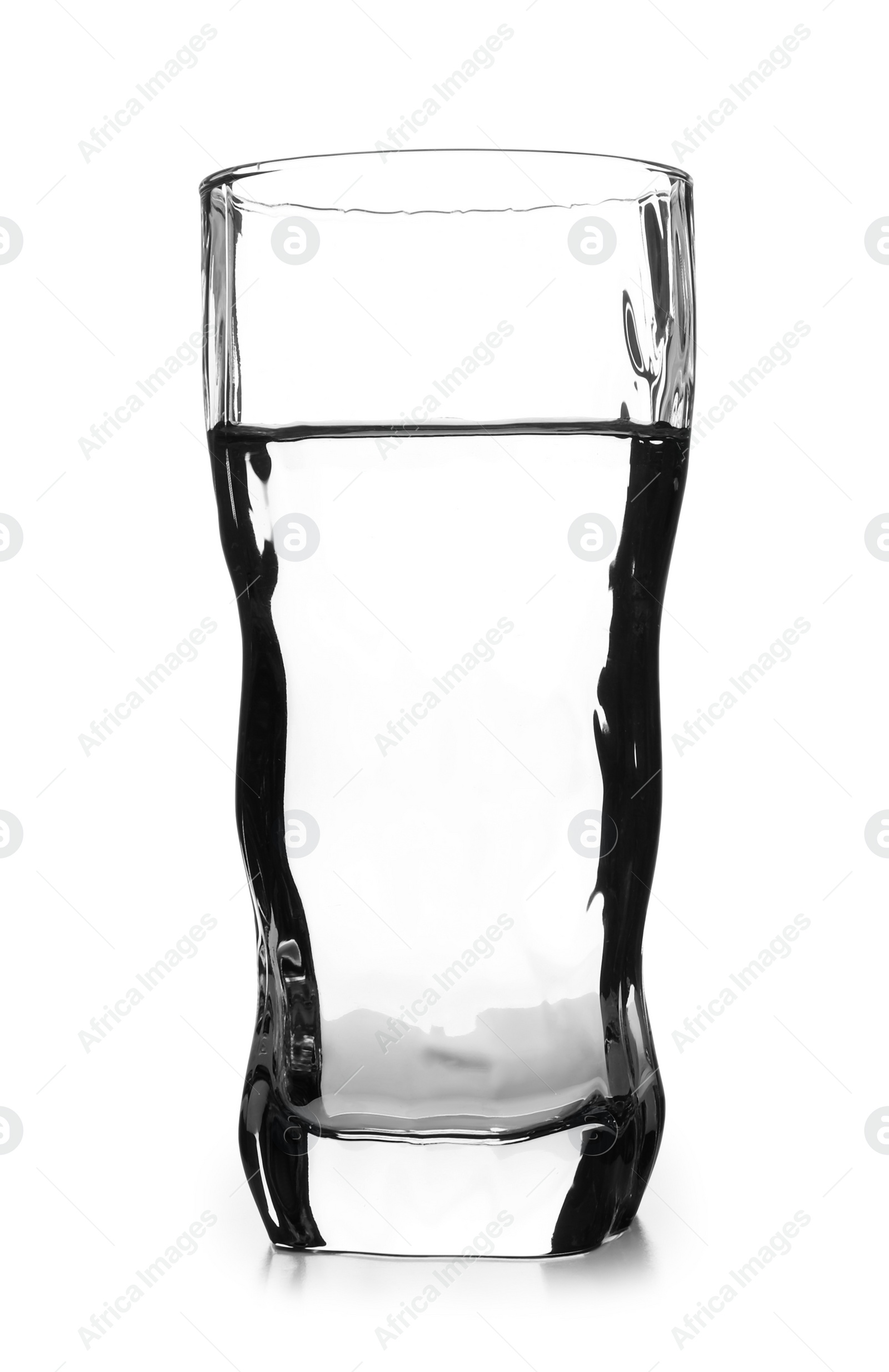 Photo of Glass of cold clear water on white background. Refreshing drink