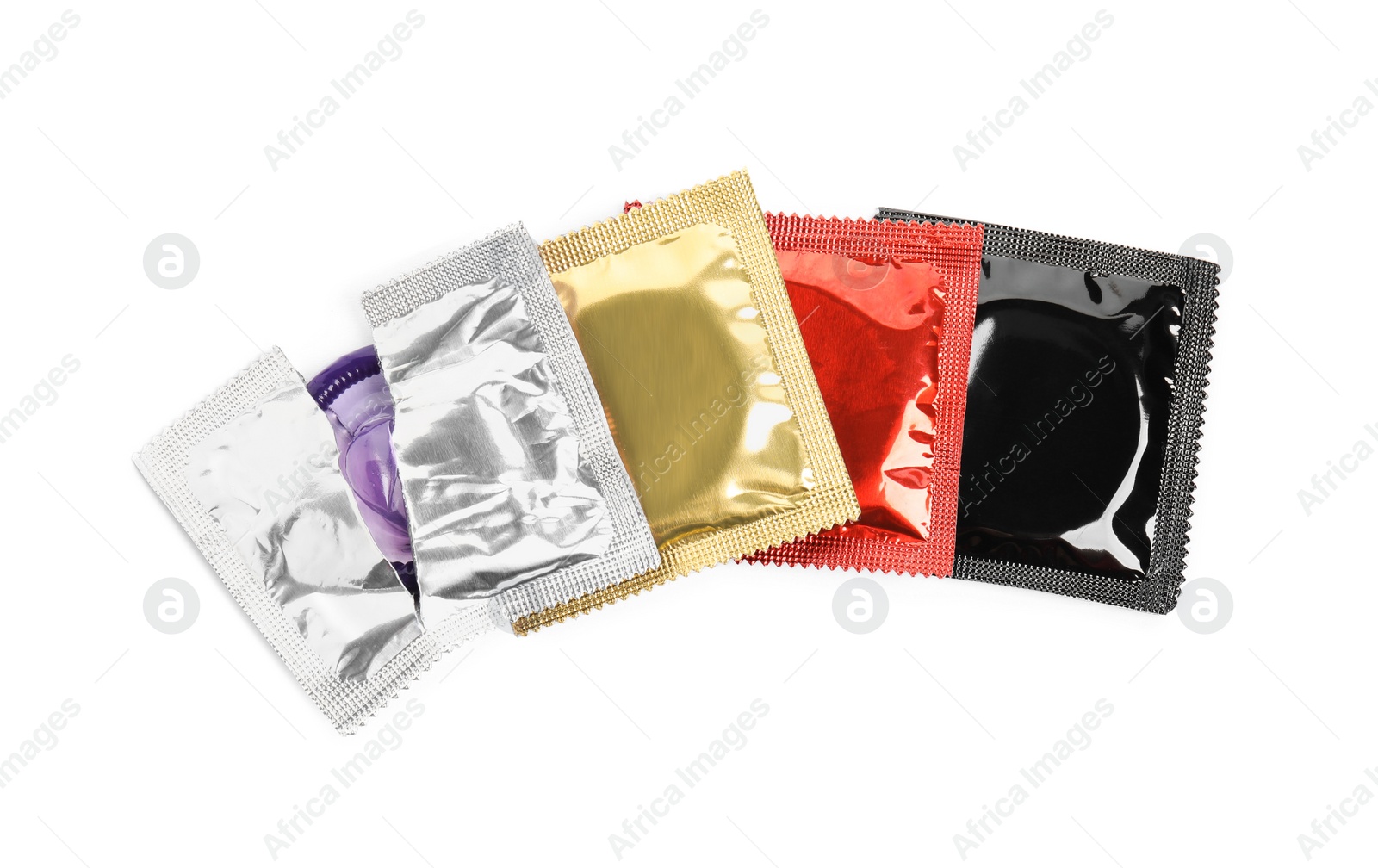 Photo of Condom packages on white background, top view. Safe sex