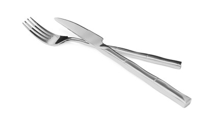 Fork and knife isolated on white. Stylish shiny cutlery set