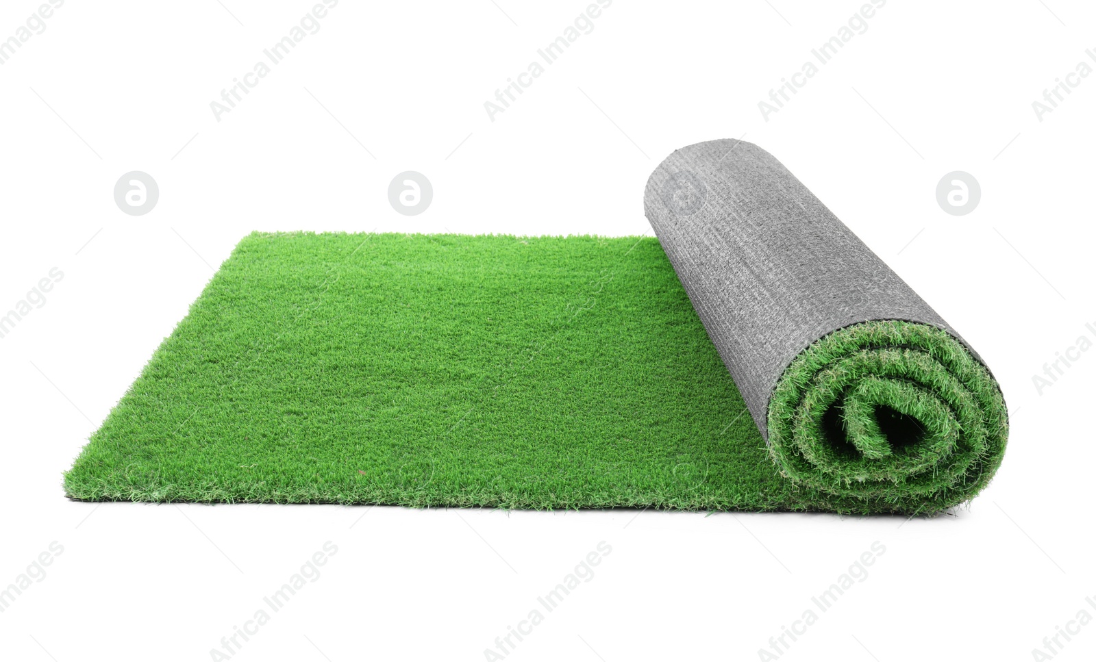 Photo of Rolled artificial grass carpet on white background. Exterior element