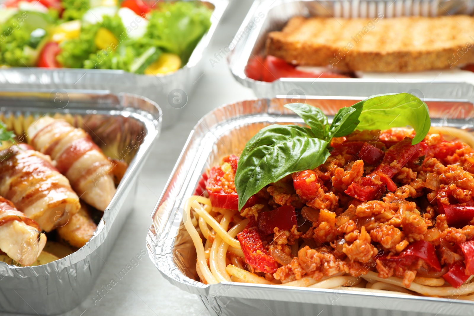 Photo of Lunchboxes on table, closeup. Healthy food delivery