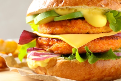 Photo of Double vegetarian burger with carrot cutlets, closeup