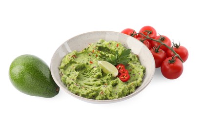 Photo of Delicious guacamole and ingredients isolated on white