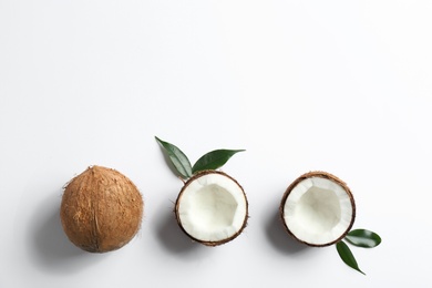 Photo of Composition with coconuts on white background, top view