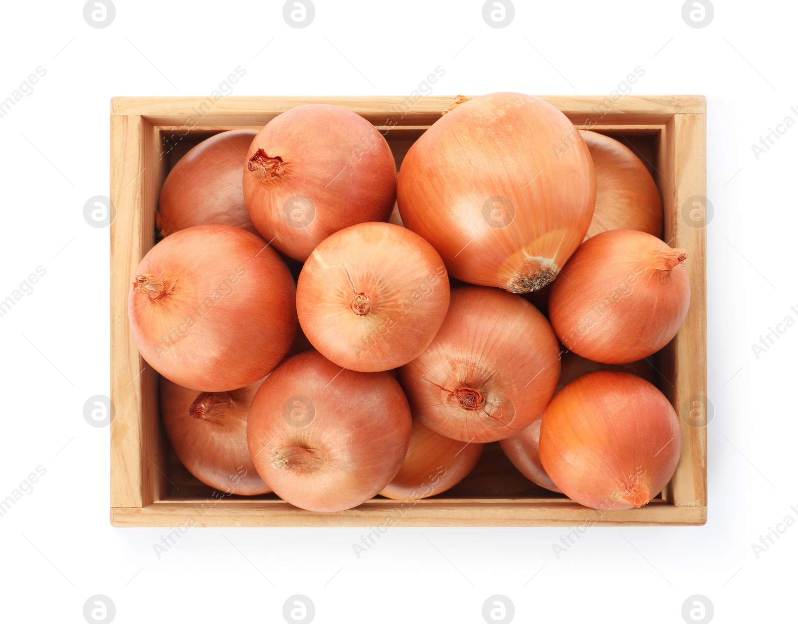 Photo of Fresh yellow onion bulbs in wooden crate isolated on white, top view