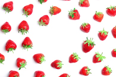 Photo of Composition with ripe red strawberries on light background