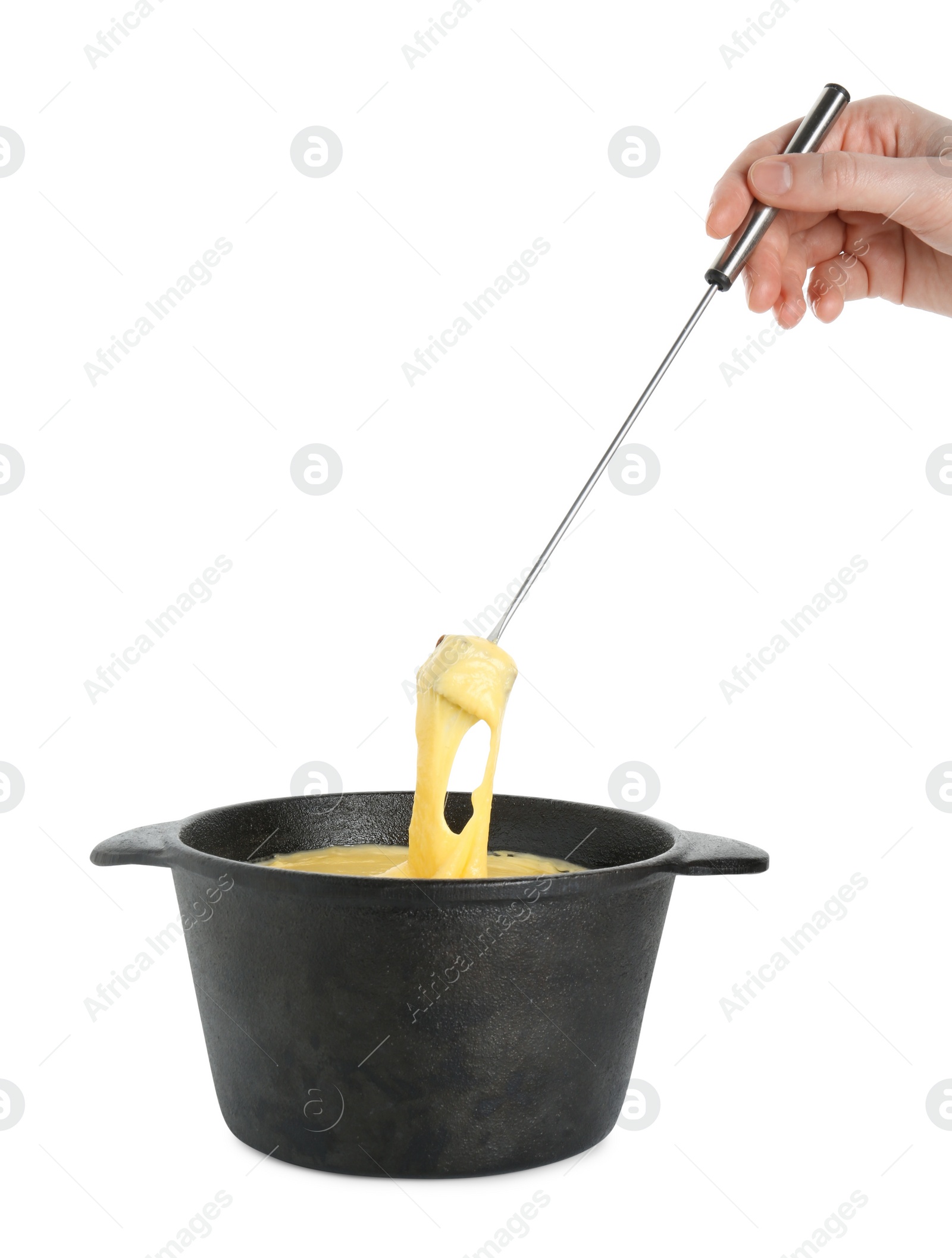 Photo of Woman dipping piece of bread into fondue pot with tasty melted cheese on white background, closeup