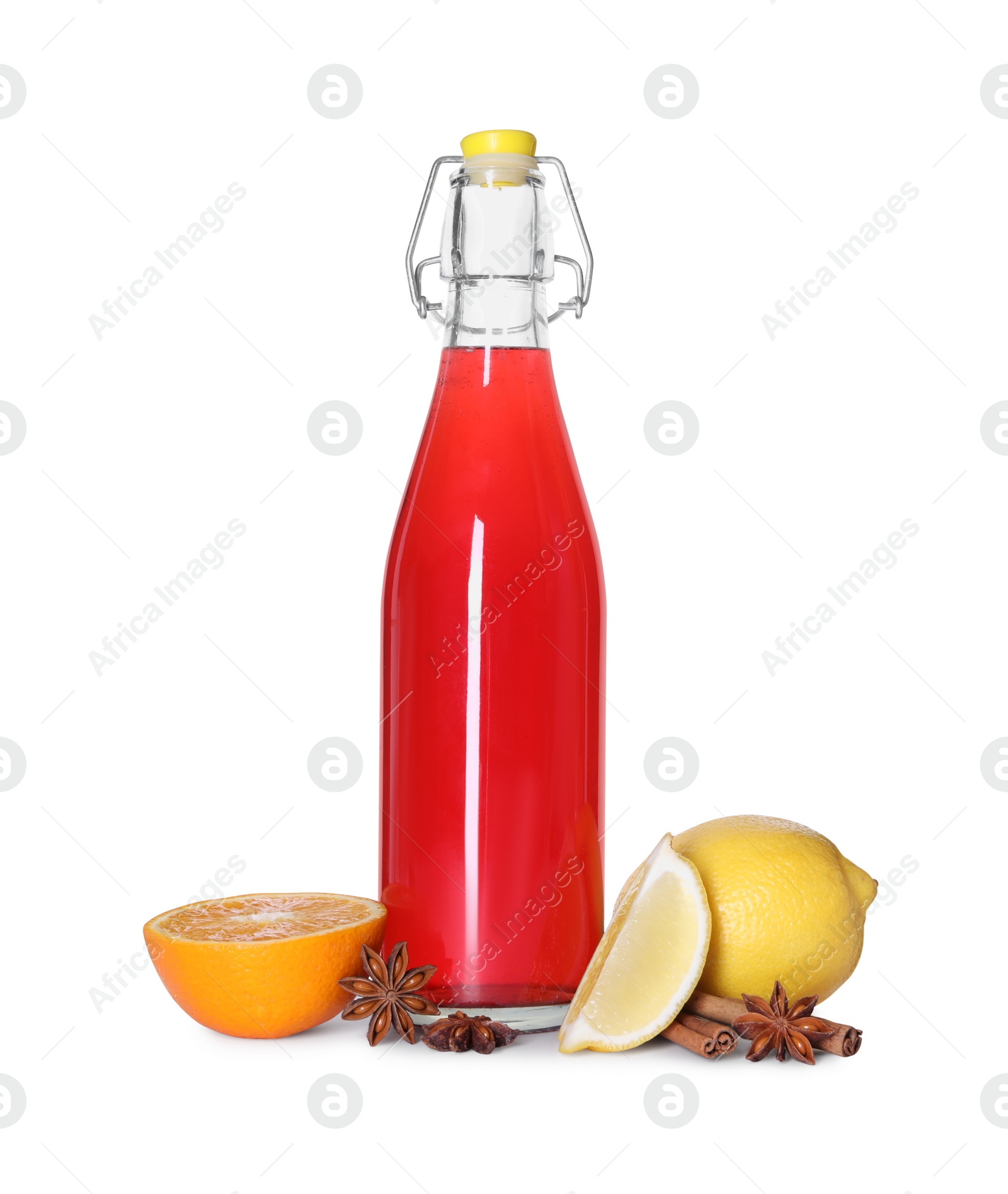 Photo of Bottle with tasty punch drink and ingredients isolated on white
