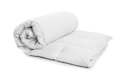 Photo of Rolled clean blanket on white background. Household textile