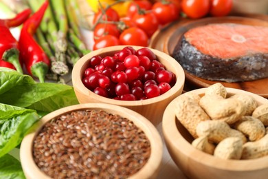 Photo of Many different healthy food on table, closeup