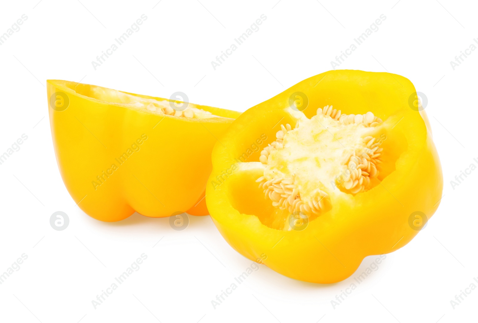 Photo of Halves of yellow bell pepper isolated on white