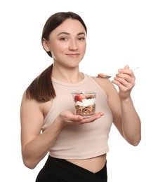 Photo of Happy woman eating tasty granola with fresh berries and yogurt on white background