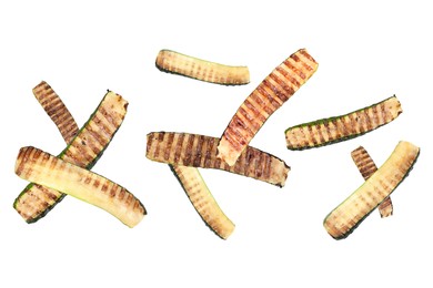 Image of Slices of grilled zucchinis in air on white background