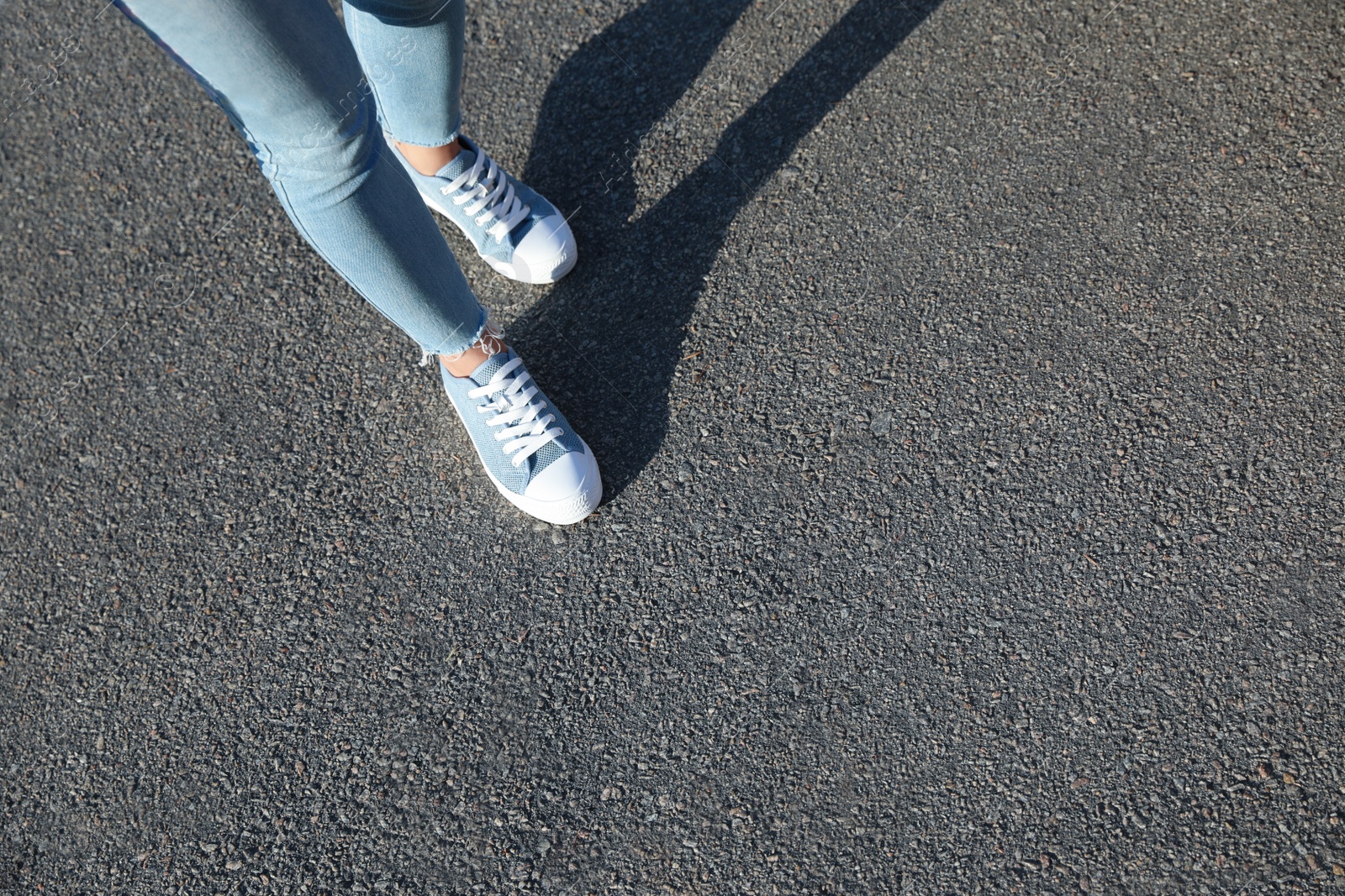 Photo of Woman walking outdoors, closeup with space for text. Choosing way concept.