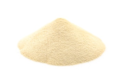 Photo of Pile of uncooked organic semolina isolated on white