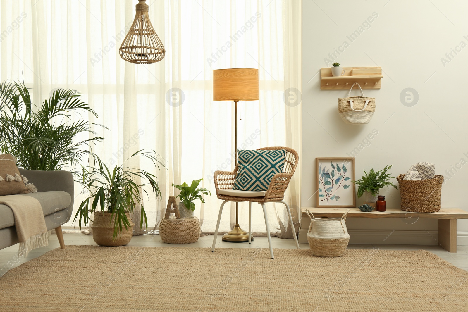 Photo of Light living room with boho decor. Interior design