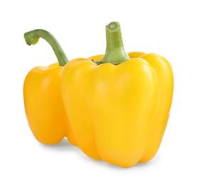 Photo of Ripe yellow bell peppers isolated on white