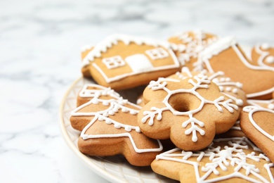 Photo of Plate with tasty homemade Christmas cookies, closeup