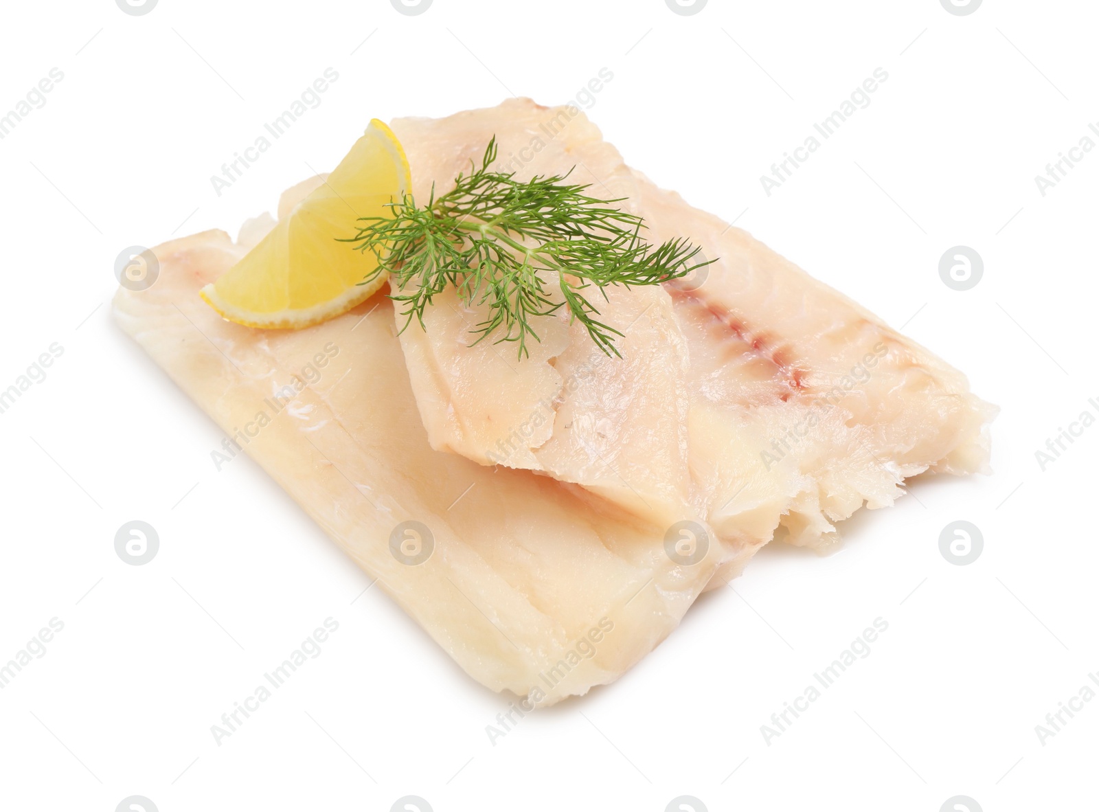 Photo of Pieces of raw cod fish, dill and lemon isolated on white