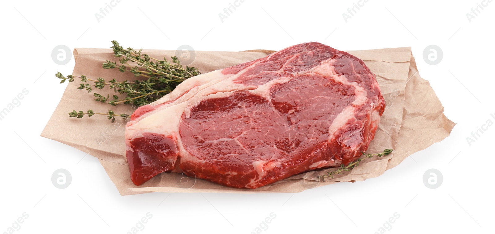 Photo of Piece of fresh beef meat and thyme isolated on white