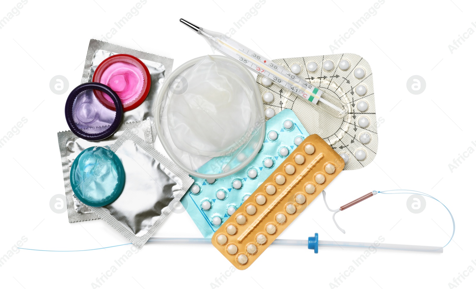 Photo of Contraceptive pills, condoms, intrauterine device and thermometer isolated on white, top view. Different birth control methods