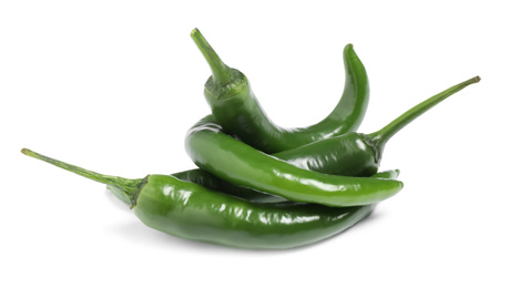 Green hot chili peppers on white background