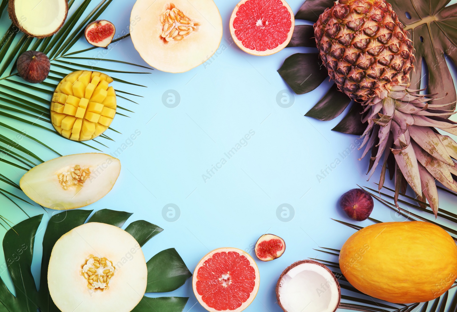 Image of Frame made of melon with other fruits and space for text on color background, top view. Summer party