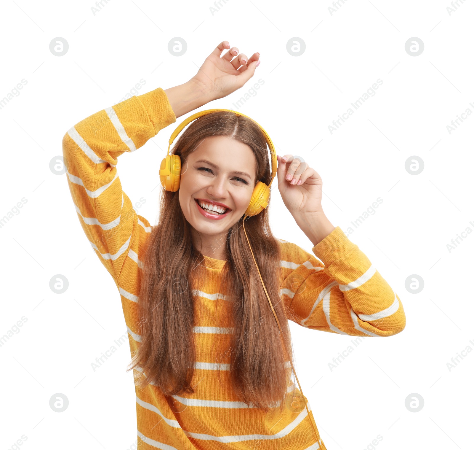 Photo of Young woman listening to music with headphones on white background