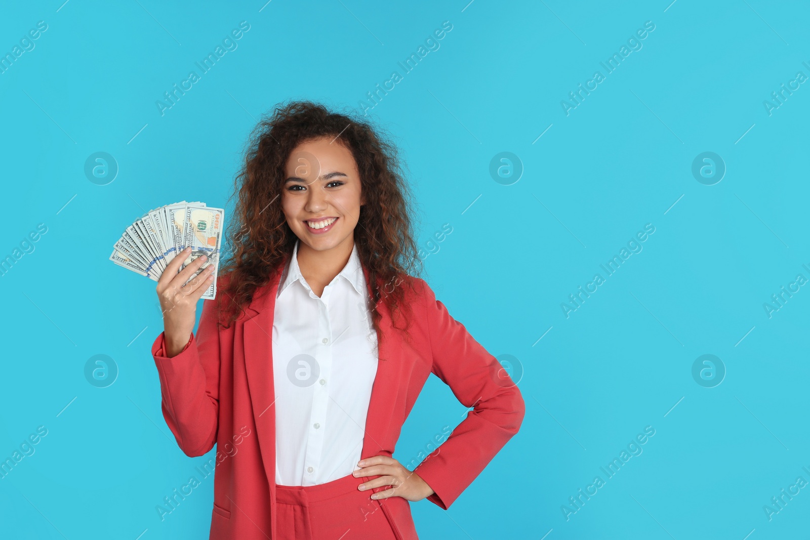 Photo of African-American businesswoman with money on color background. Space for text