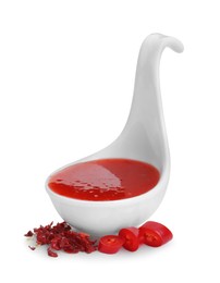 Photo of Chili sauce in spoon isolated on white