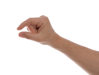 Man holding something against white background, closeup of hand