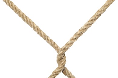 Photo of Twisted hemp ropes isolated on white. Natural material