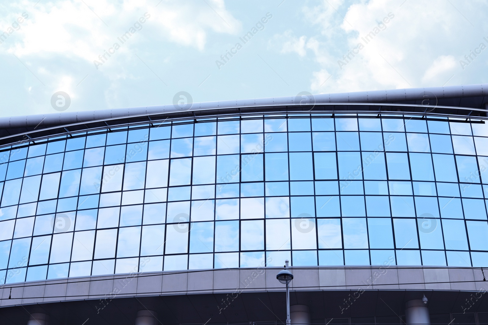 Photo of Building with tinted windows. Modern architectural design