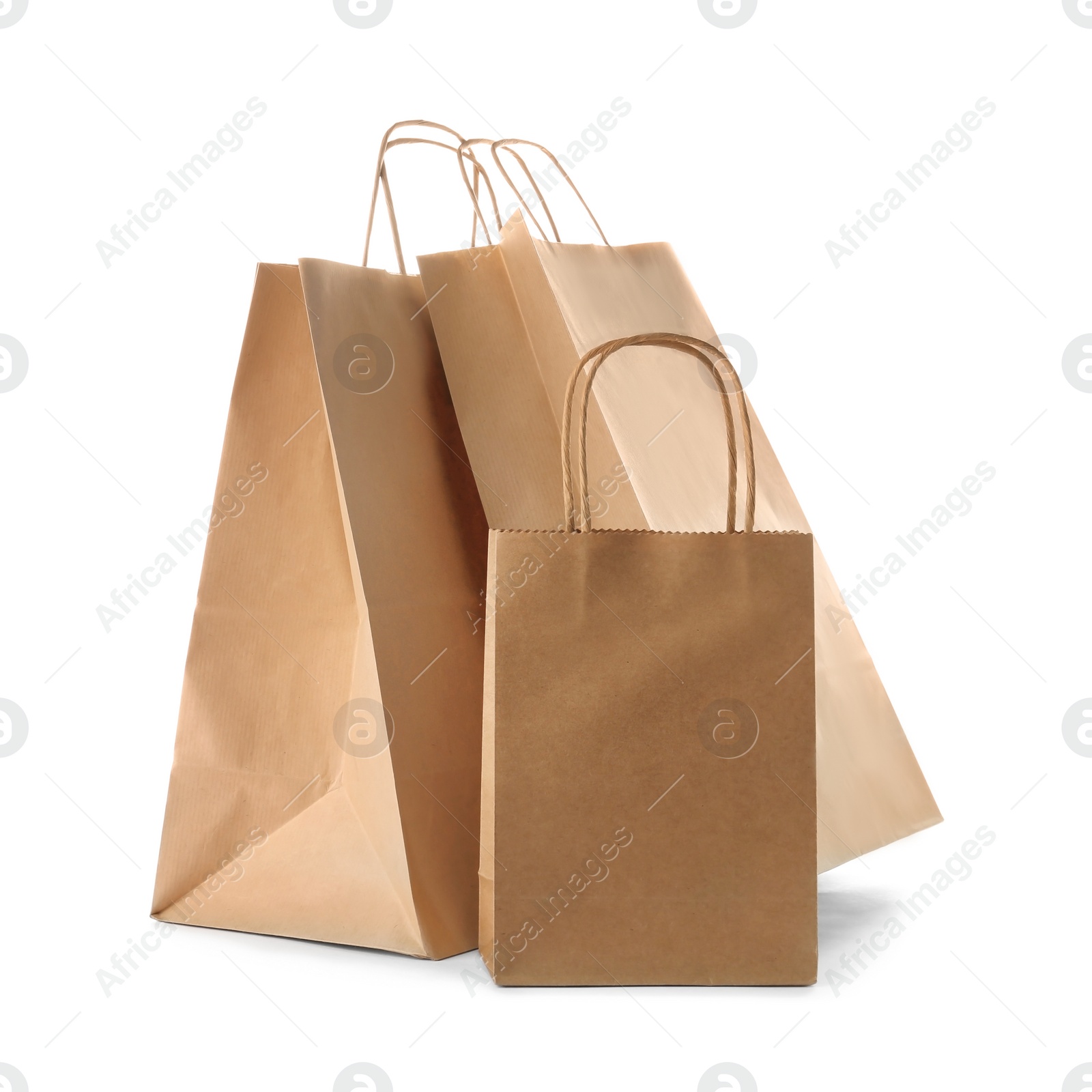 Photo of Mockup of paper shopping bags on white background