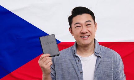 Immigration. Happy man with passport against national flag of Czech Republic, space for text. Banner design