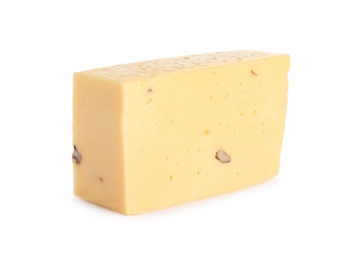 Piece of delicious cheese with nuts on white background