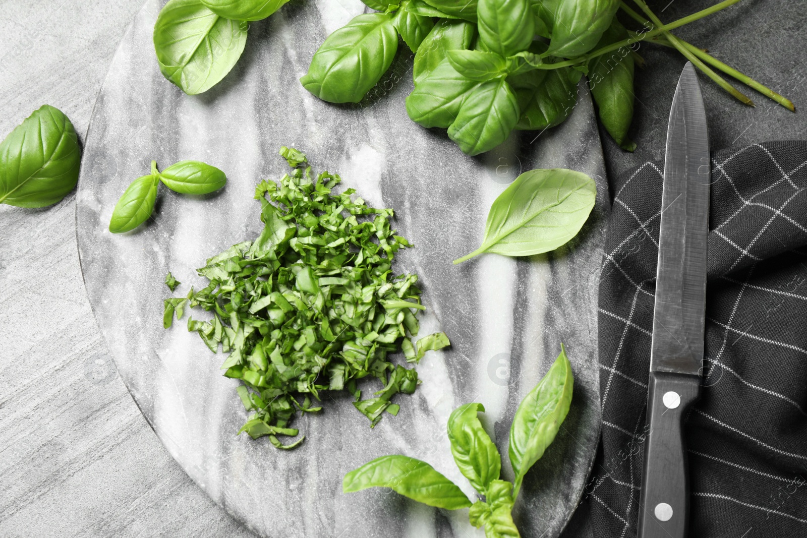 Photo of Flat lay composition with fresh basil on light grey table