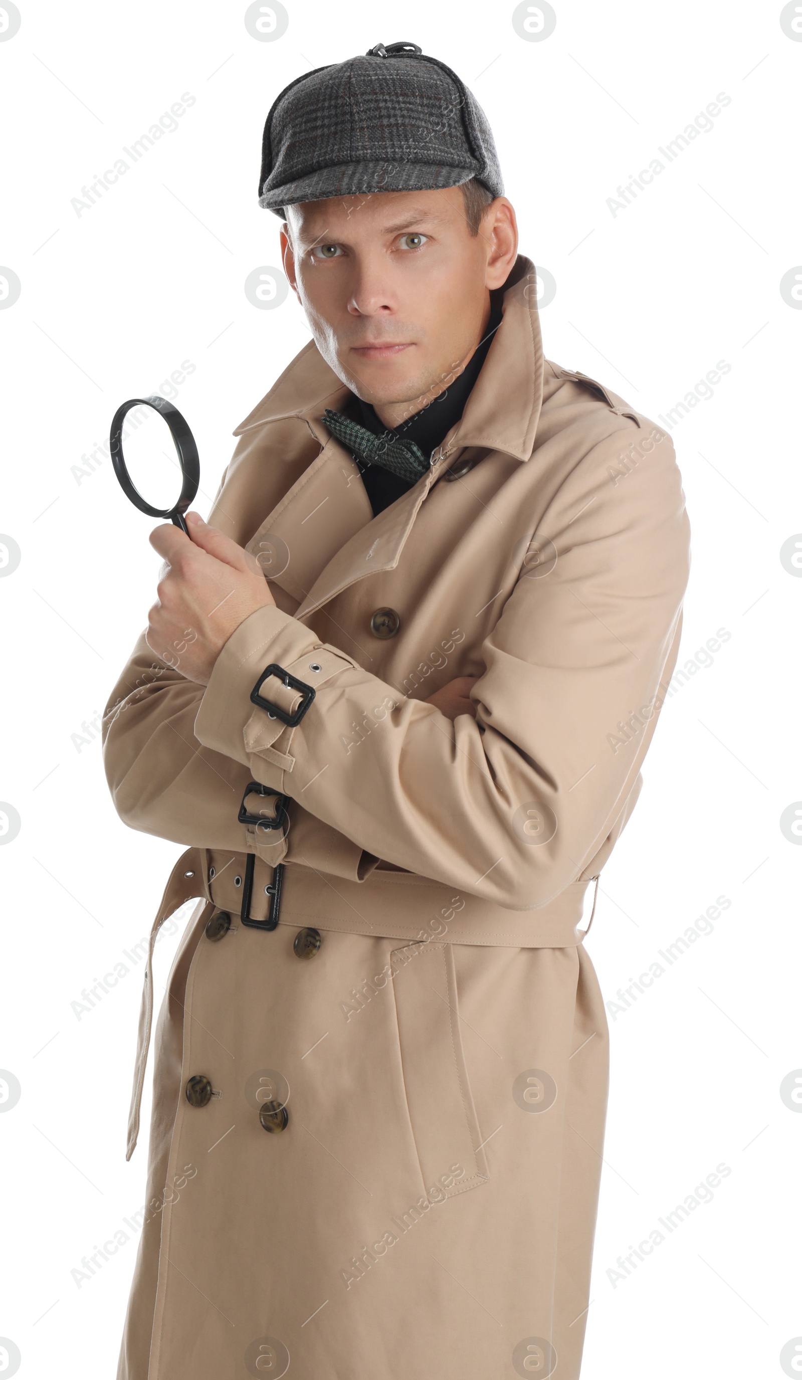 Photo of Male detective with magnifying glass on white background
