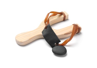 Photo of Wooden slingshot with pebble isolated on white