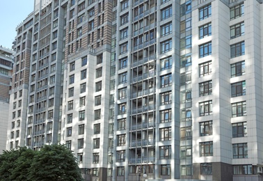 KYIV, UKRAINE - MAY 21, 2019: Beautiful view of modern housing estate in Pecherskyi district on sunny day