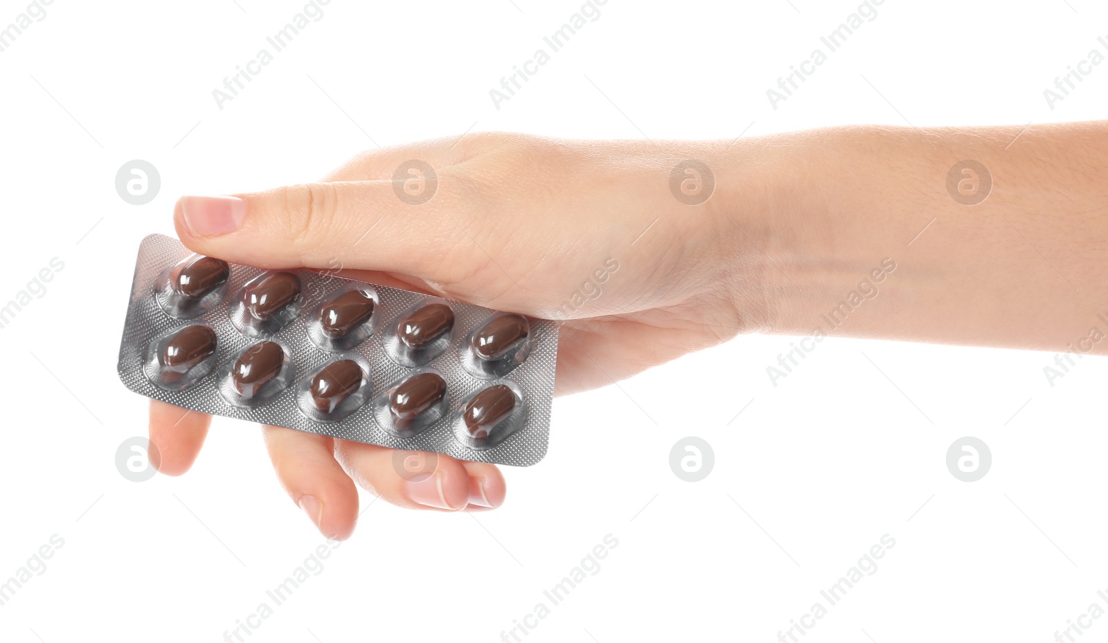 Photo of Woman holding pills in blister pack on white background, closeup