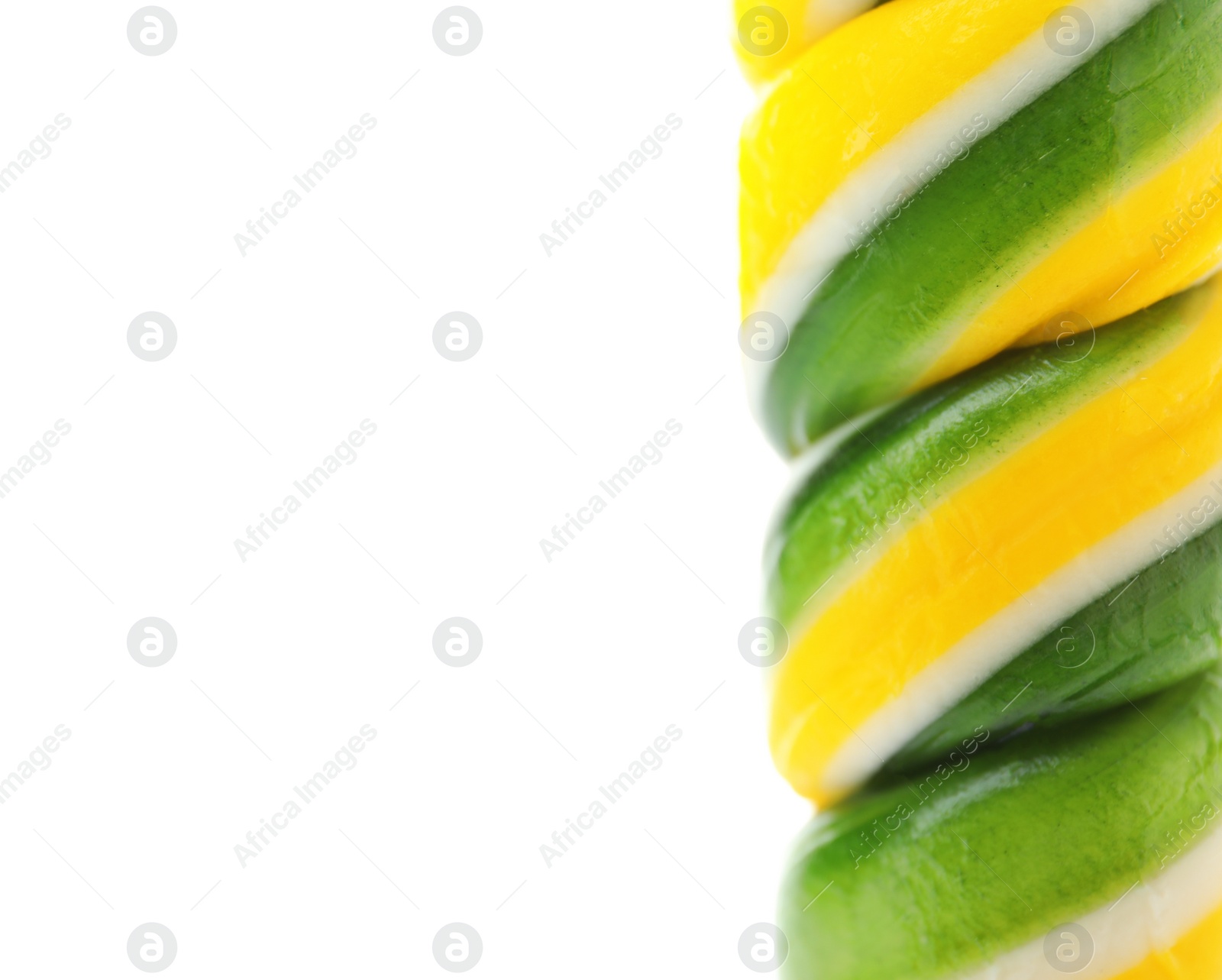 Photo of Tasty colorful fruit flavored candy on white background