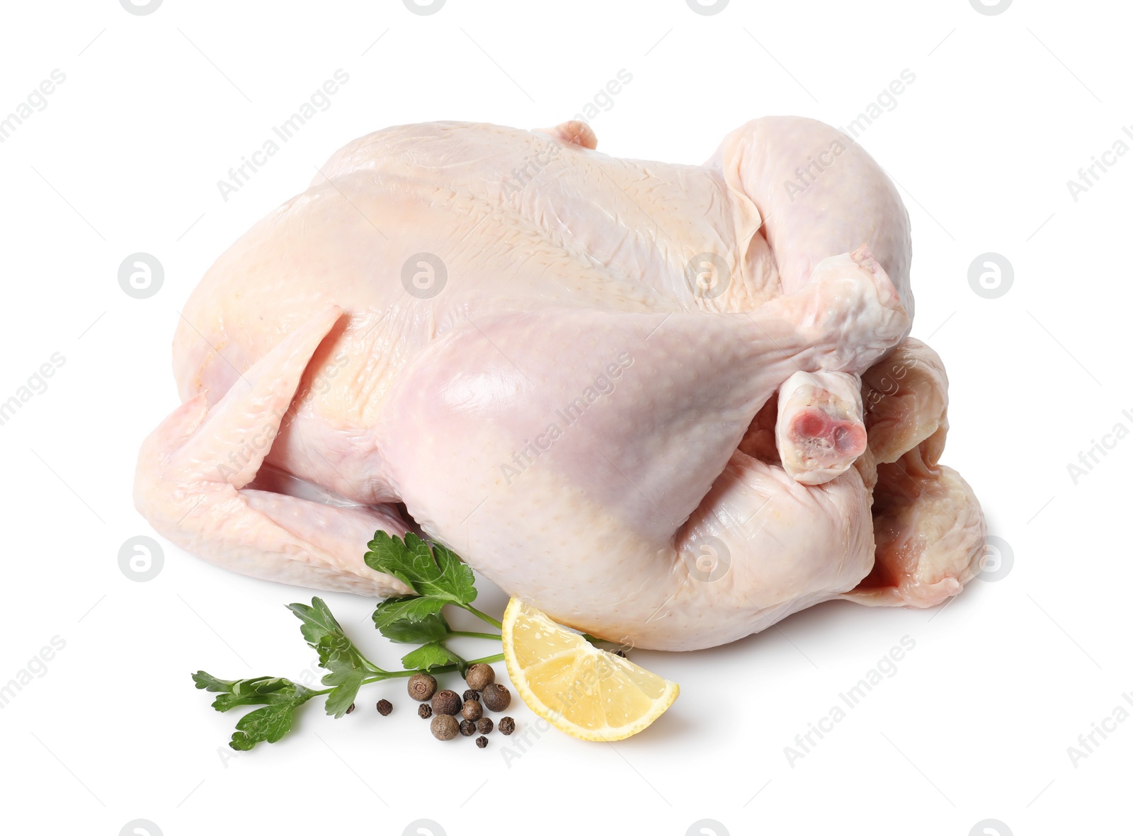 Photo of Fresh raw chicken with lemon and spices isolated on white