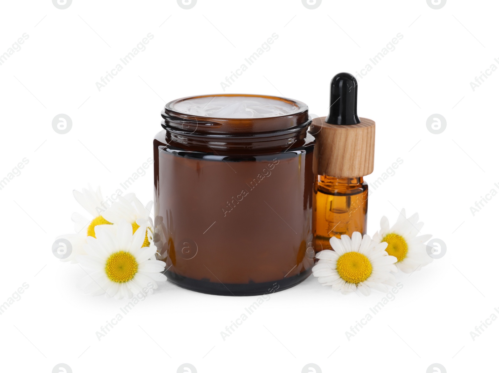 Photo of Different hand care cosmetic products and chamomiles on white background