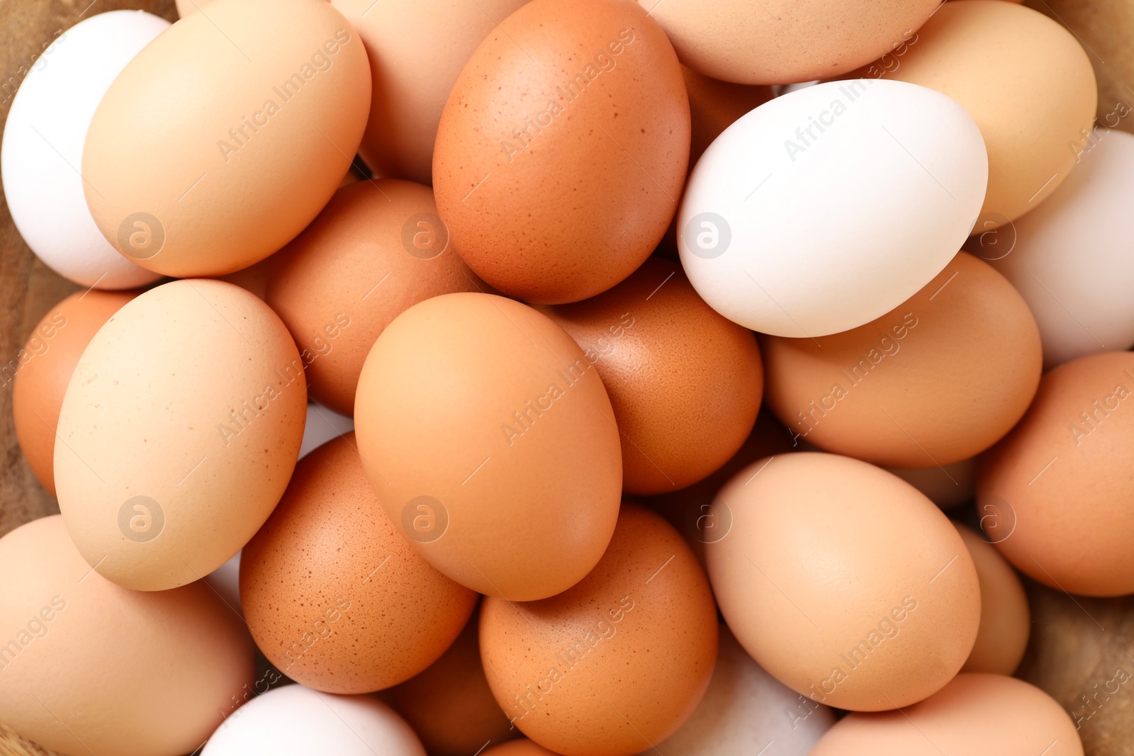 Photo of Fresh chicken eggs as background, top view