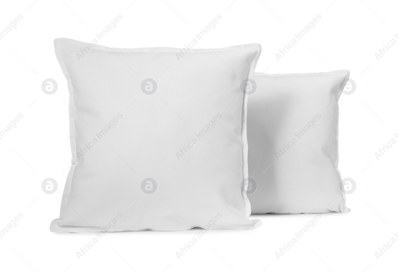 Photo of Two new soft pillows isolated on white