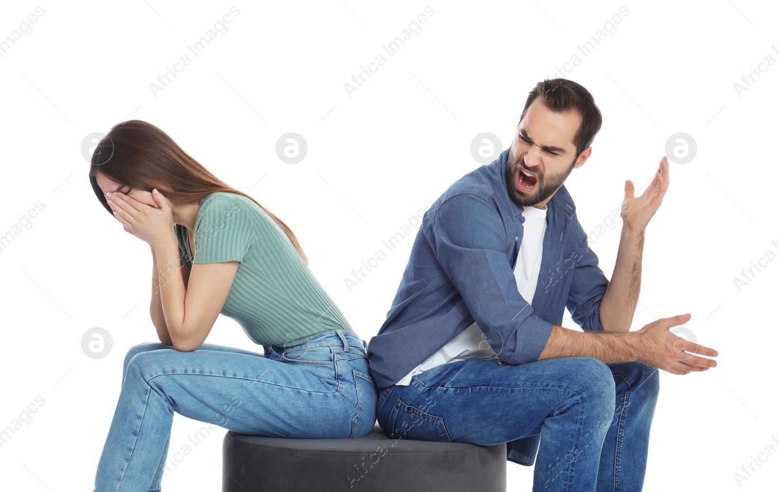 Photo of Man shouting at his girlfriend on white background. Relationship problems