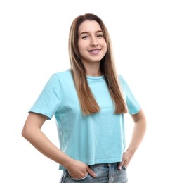 Photo of Portrait of smiling woman with dental braces on white background