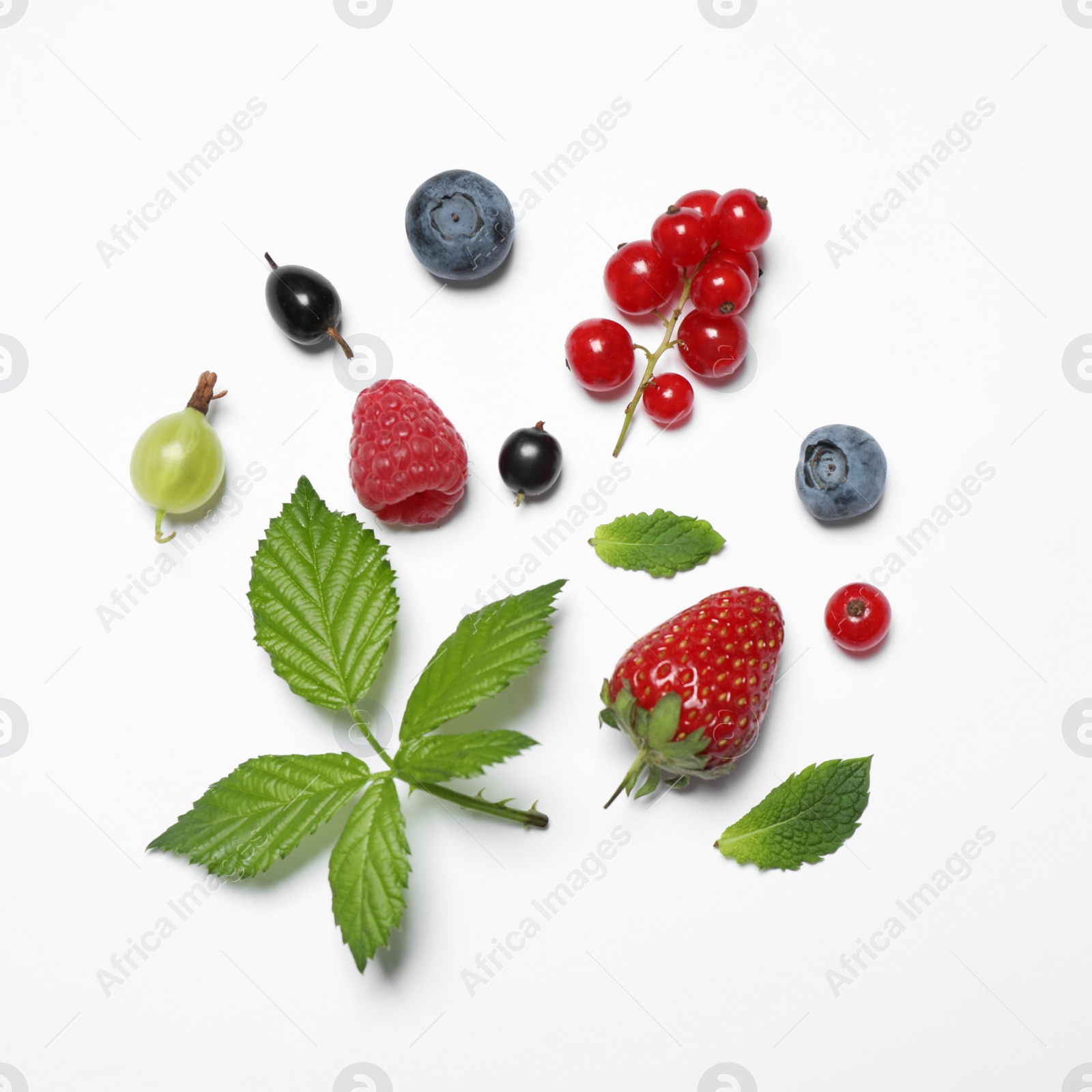 Photo of Mix of fresh berries on white background, flat lay